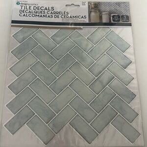 Peel and stick tile backsplash.
